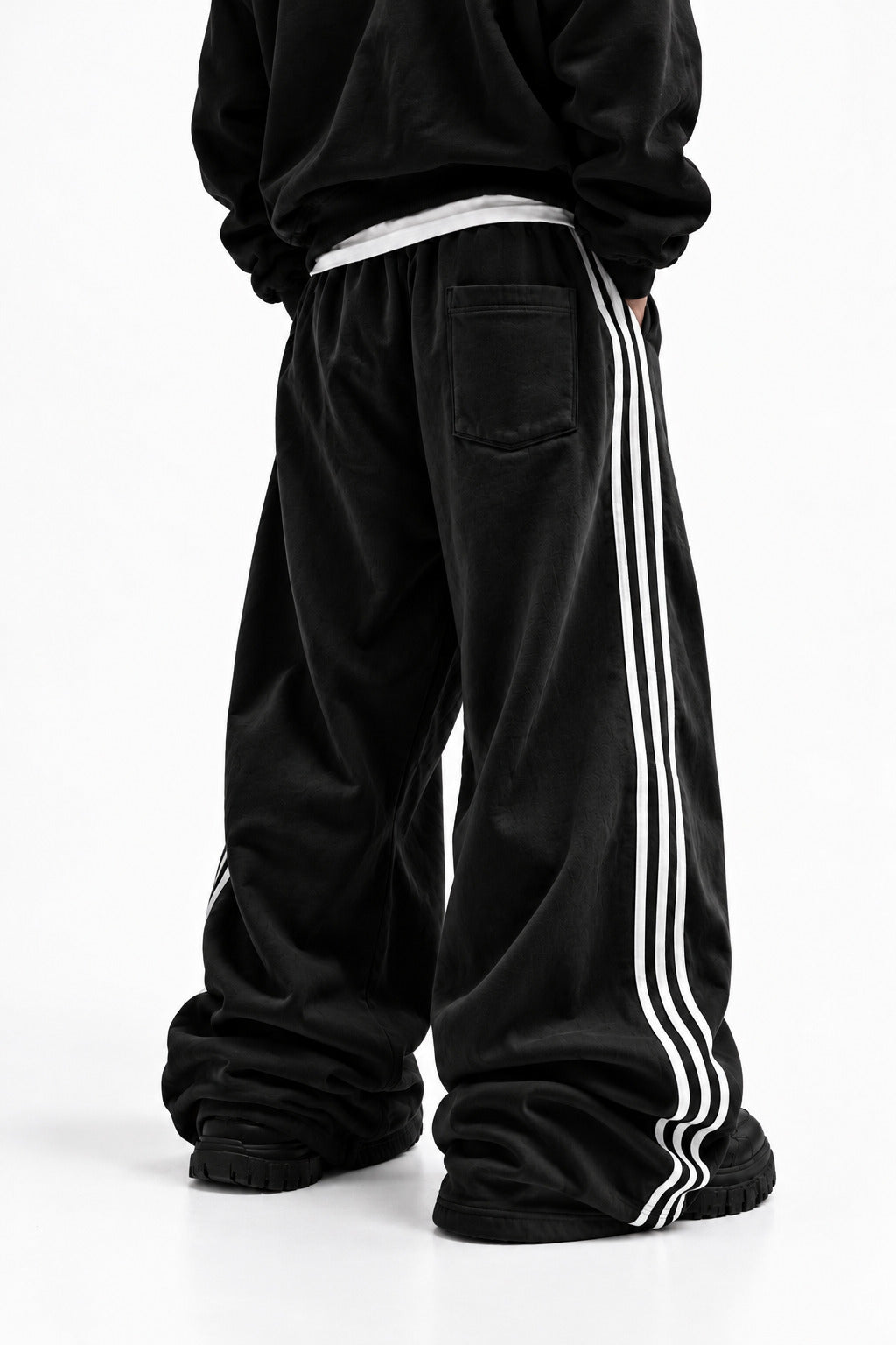 Drift Track Pants Obsidian, worn, back view, with the back patch pocket
