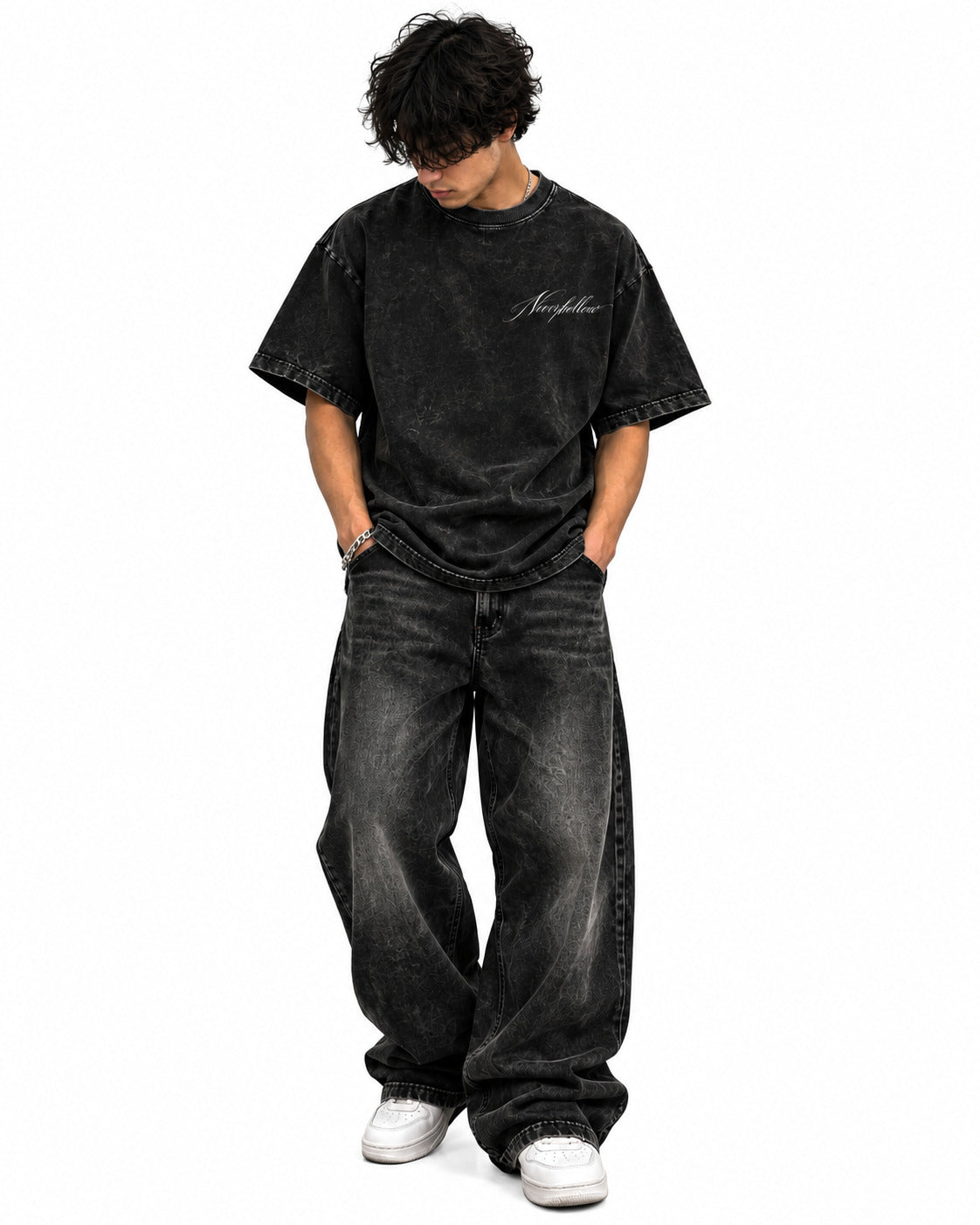 Hush Tee Obsidian, worn, front view, with the Neverhollow script on the chest