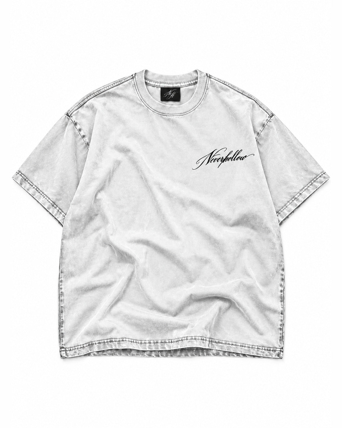 Hush Tee Bone laid flat, front, with the NH label at the neck